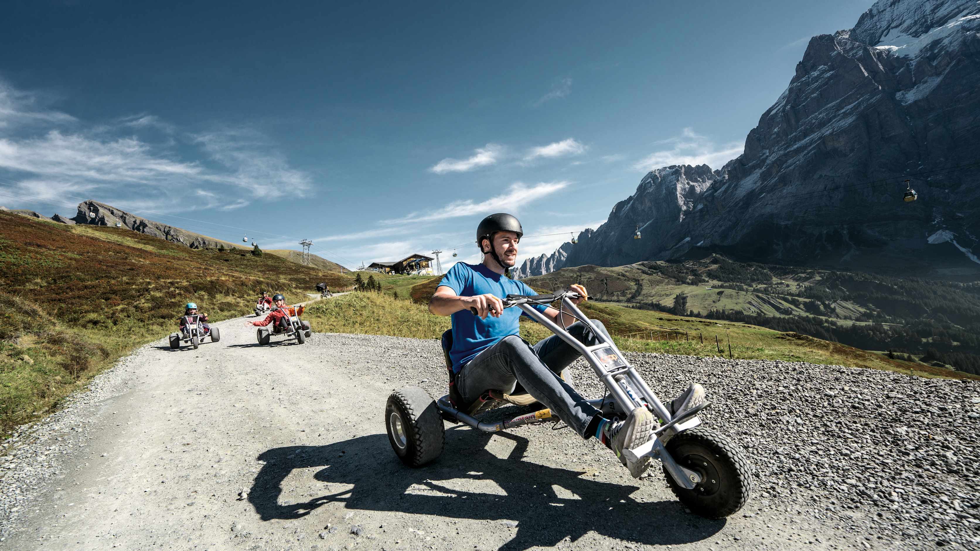 Grindelwald First Mountain Cart Personen Frontaufnahme