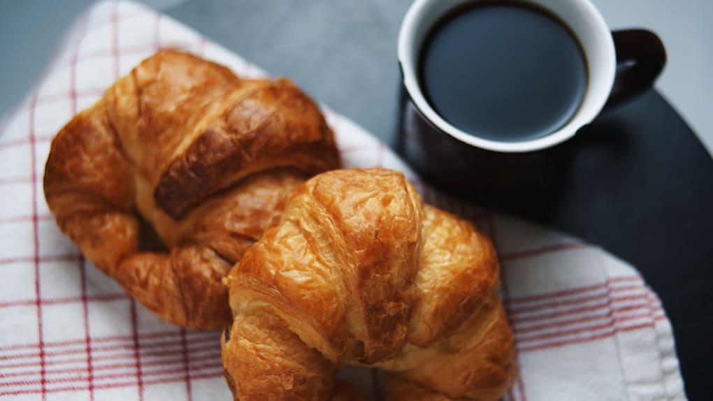 Napkin, No People, Baked, Refreshment, Breakfast, High Angle View, Day, Table, Indoors, Focus On Foreground, Coffee Cup, Freshness, Temptation, Baked Pastry Item, Food, Food And Drink, Still Life, Croissant, Coffee - Drink, Unhealthy Eating, Drink, Sweet Food, Horizontal Image
